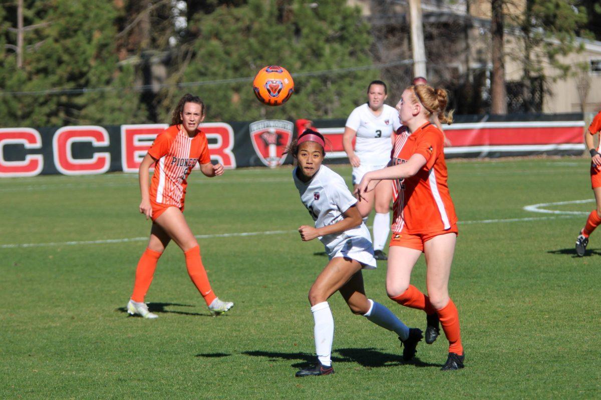 #11 Kalena Pfaeltzer, Jr., Heads the ball into the path of a teamate, Spokane Wa, 10-30-21