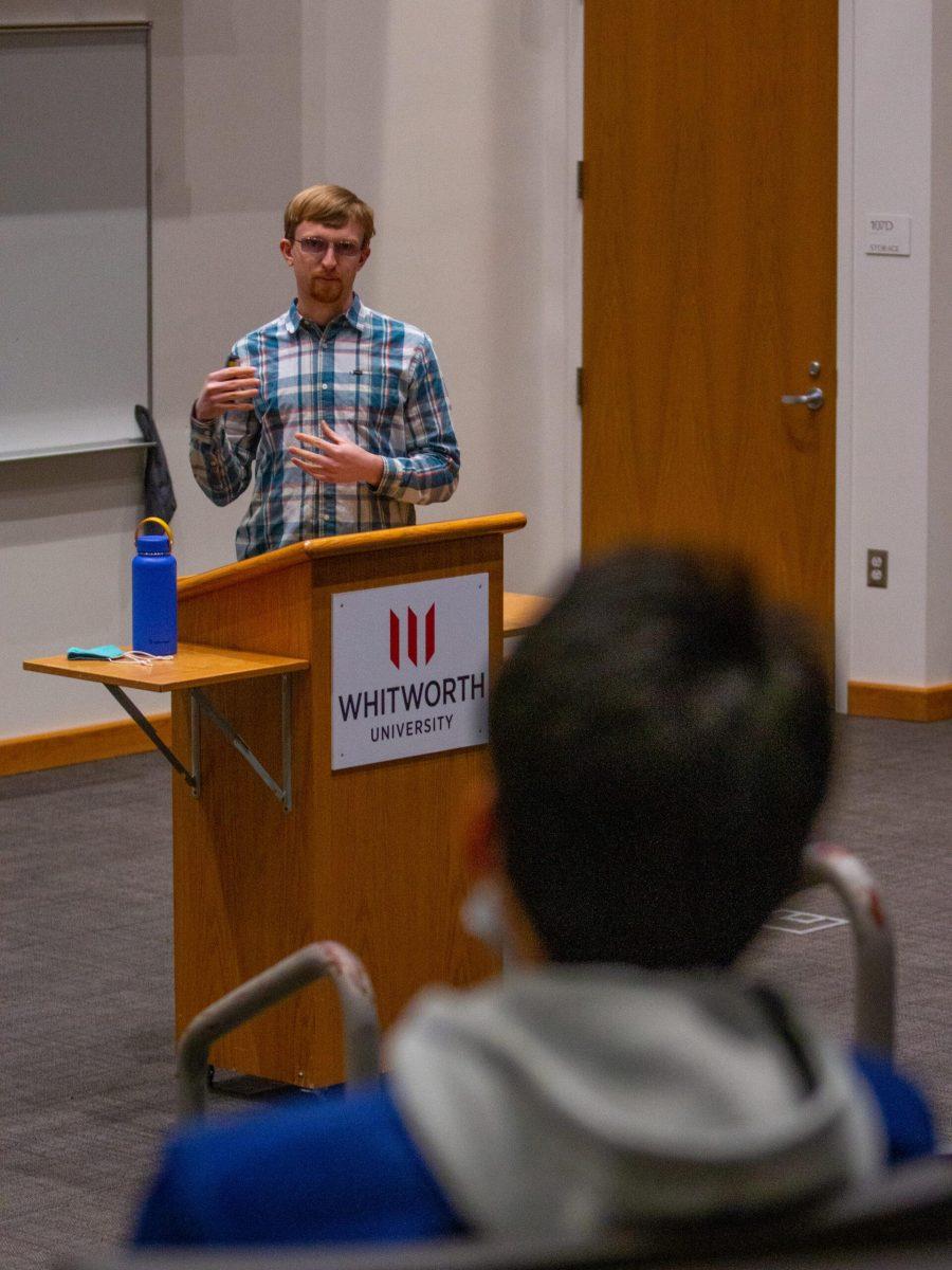 Nate Beine gives a recap of his travels to the COP26 Confrence in Weyerhauser Hall Thursday Dec. 9 | Photos by Ben Gallaway/ The Whitworthian