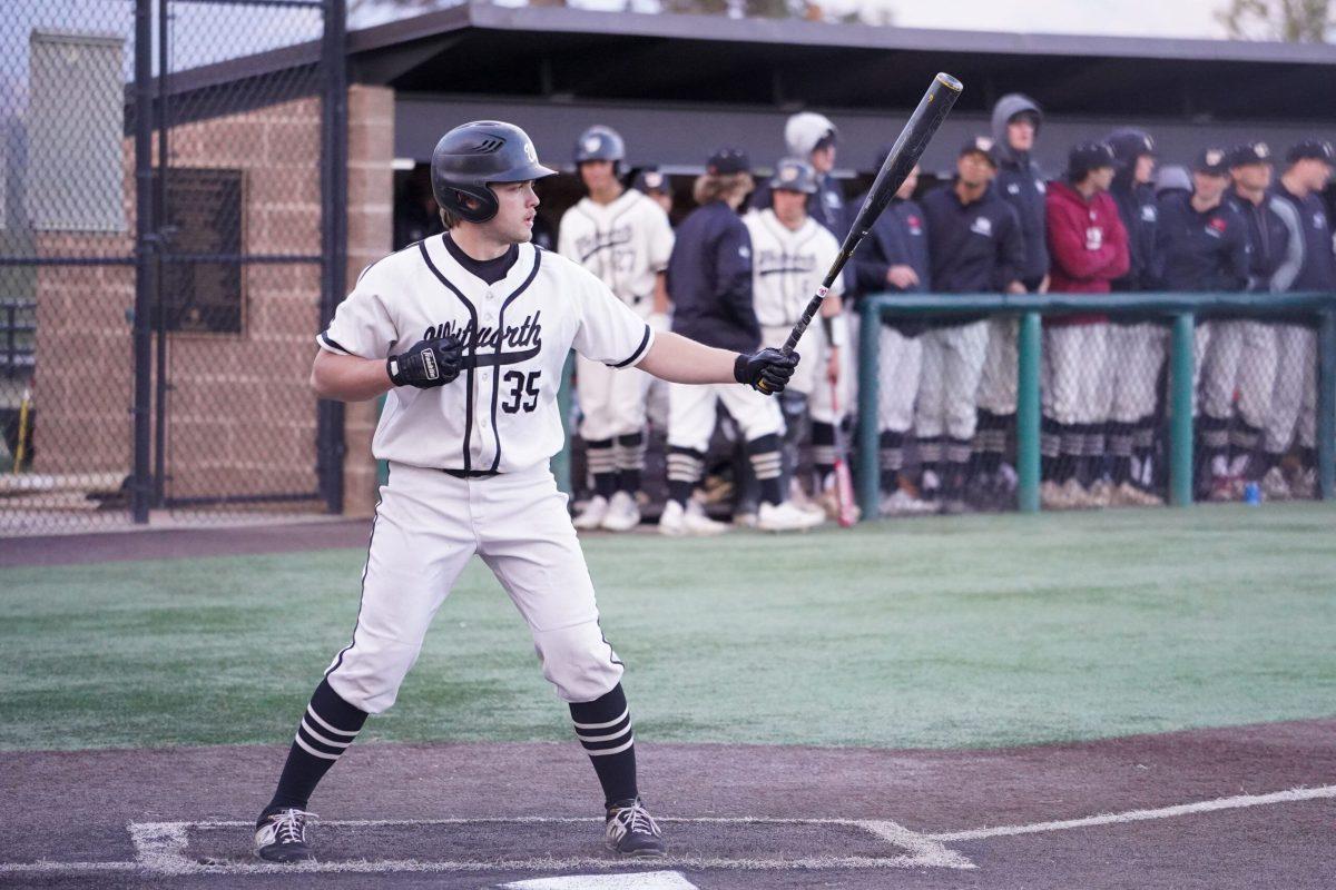#35 Jaxsen Sweum prepares for a pitch during extra innings of game #2 of an NCAA college baseball doubleheader at Whitworth University against University of Puget Sound, Saturday, Apr. 9, 2022, in Spokane, Wash. | Caleb Flegel/The Whitworthian