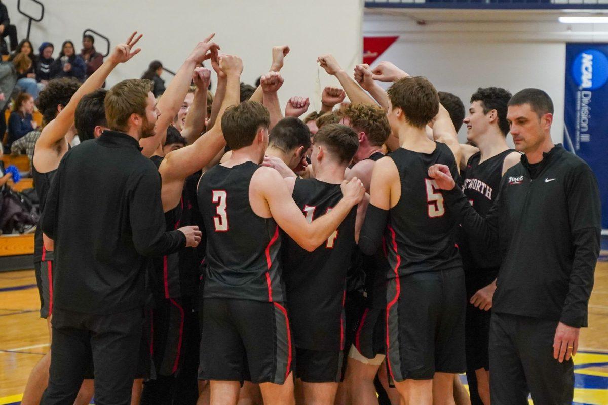 The Whitworth mens basketball team celebrates a win after the Northwest Conference mens basketball title game, Whitman University, Saturday, Feb. 25, 2023 in Walla Walla, Wash. Caleb Flegel/The Whitworthian