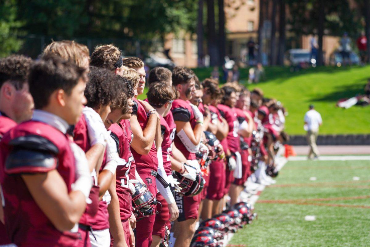 Members of the Whitworth football team line up for the national anthem, Saturday Sep. 2nd, 2023, at a Whitworth University football game against Pacific Northwest Christian College in Spokane, Wash. | Caleb Flegel/The Whitworthian