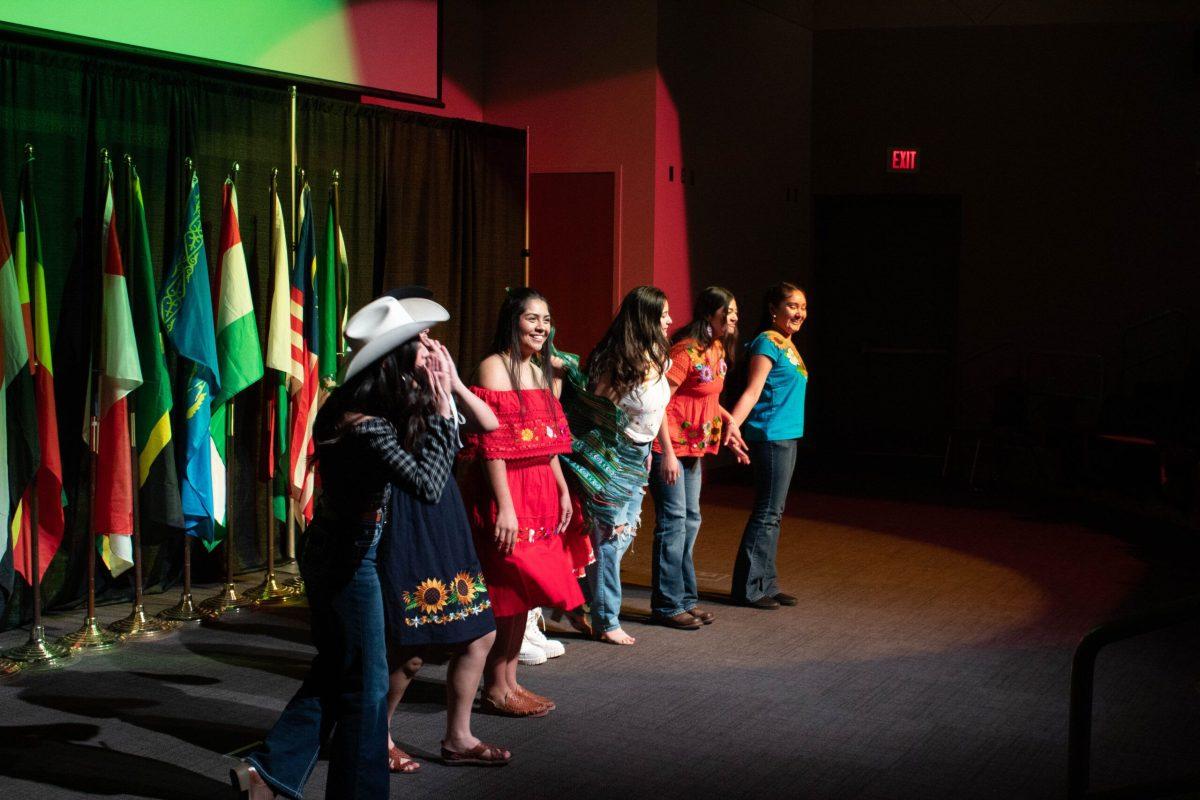 Students proudly representing their culture and flags at the 38th Annual I-Fest at Whitworth University, Friday, Dec. 1, 2023, in Spokane, Wash. | Abraham Santiago/The Whitworthian