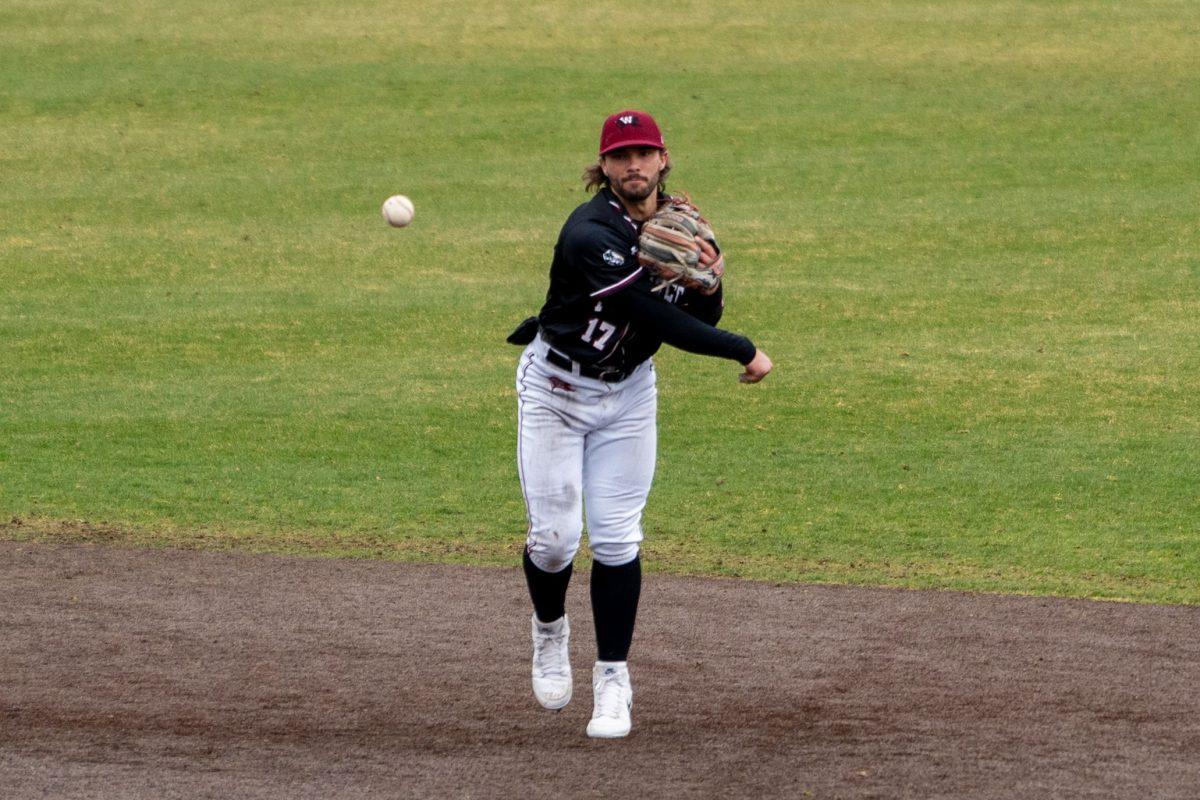 #17 Spencer Shipman throws a ball to first base at a NCAA baseball game against Claremont-Mudd-Scripps, Saturday Apr. 6, 2024, at Whitworth University in Spokane, Wash. | Caleb Flegel/The Whitworthian