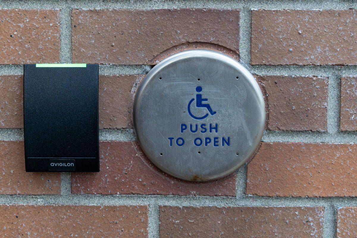 Automatic door button outside the Hixon Union Building, Monday, Mar 4, 2024, at Whitworth University in Spokane, Wash. | Caleb Flegel/The Whitworthian