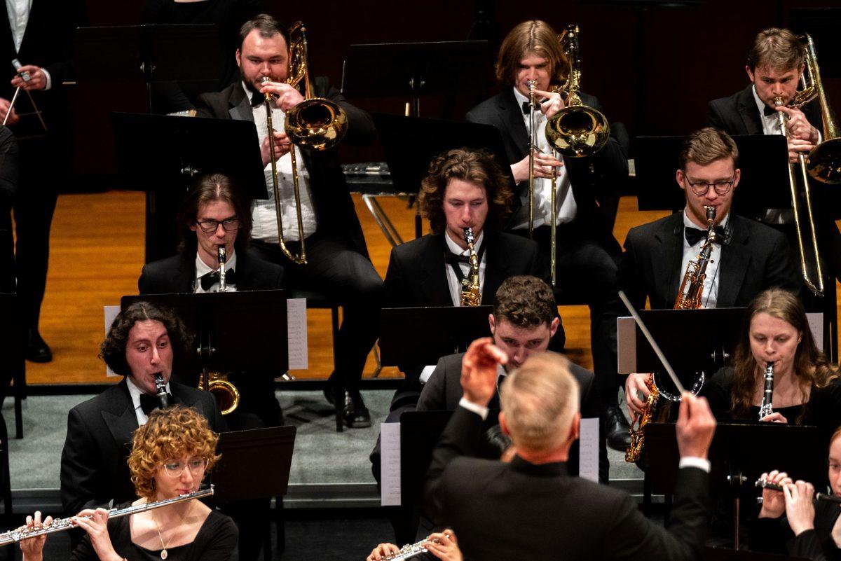 Dr. Richard C. Strauch conducts the Whitworth Wind Symphony at the Wind Currents Concert in the Fox Theater, Spokane, Wash.  Mon. Mar 18, 2024 | Ben Gallaway/ The Whitworthian