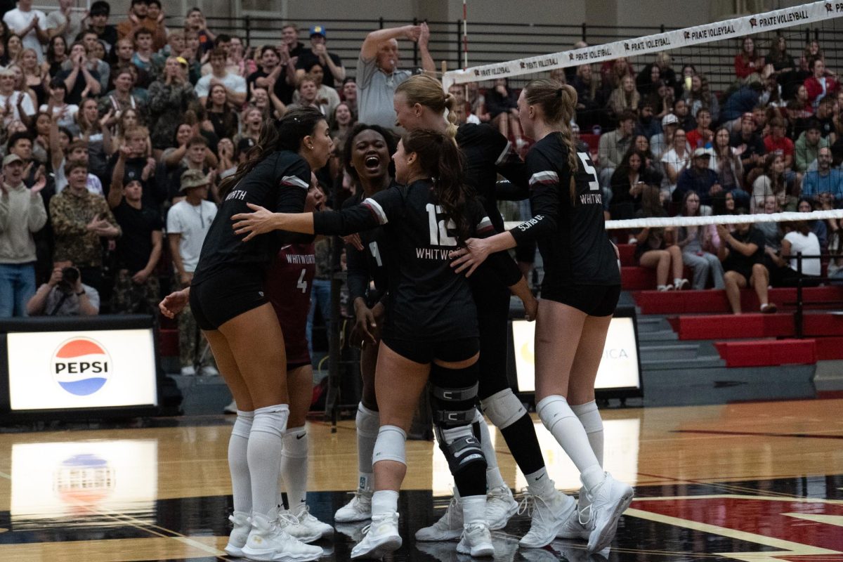 Whitworth Women’s Volleyball celebrates scoring against Pacific University at Whitworth University, Friday, Sept. 20, 2024, in Spokane, Wash. | The Whitworthian/Madison Stoeckler