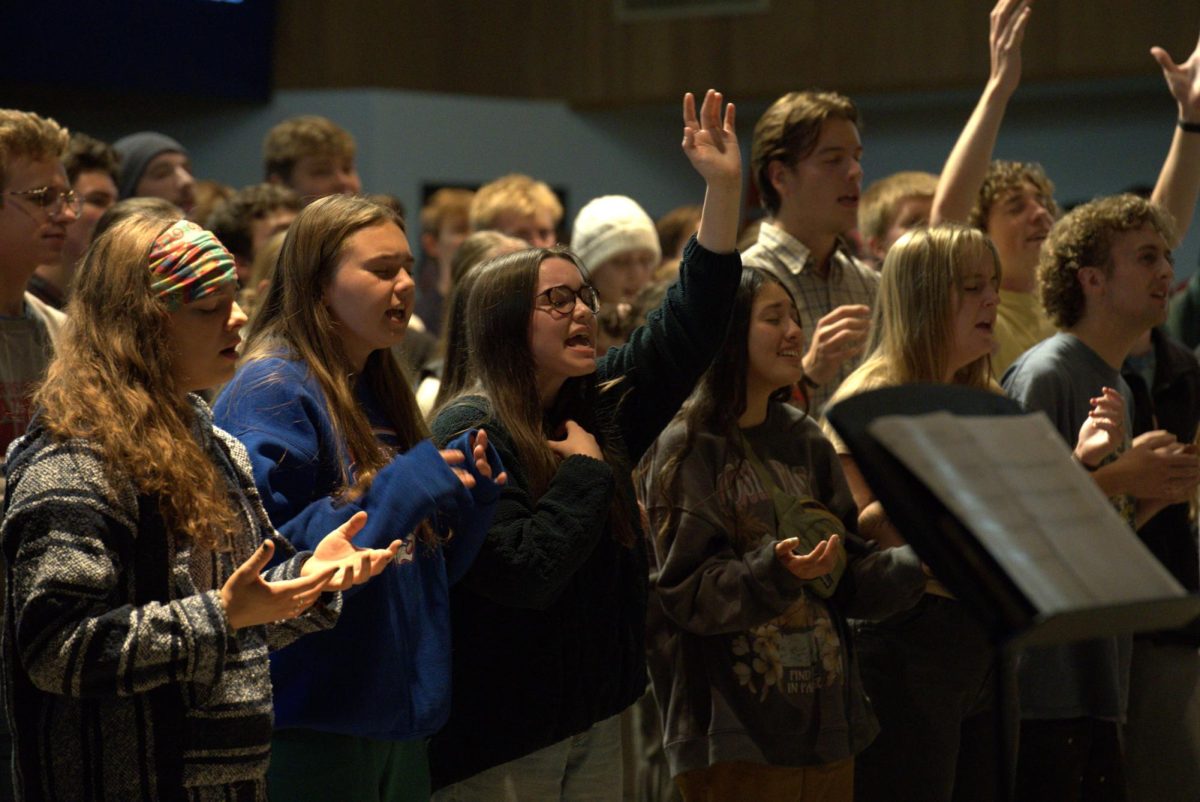 Students worship while The Porter's Gate plays in the Chapel at Whitworth University Thursday, October 17, 2024, in Spokane, Wash. | The Whitworthian/Madison Stoeckler