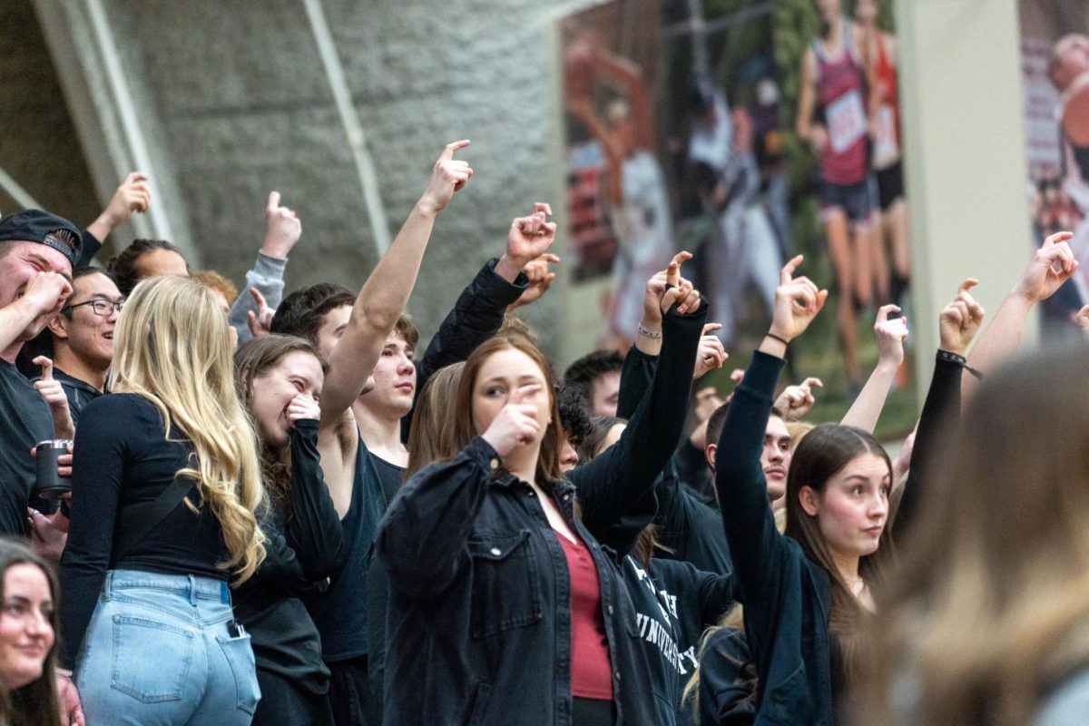 Whitworth basketball fans hold up hooks for a free throw, Saturday, Feb. 24, 2024, at a NCAA Men's Basketball game at Whitworth University in Spokane, Wash. | Photo by Caleb Flegel, courtesy of the Whitworth Athletics Department