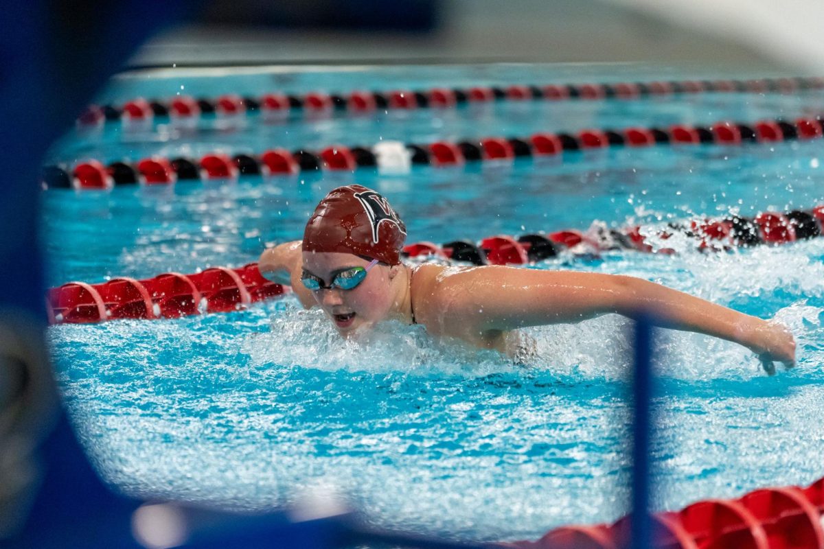 Isabella Hooper swims the butterfly, Friday, Nov. 3, 2023, at a NCAA swim meet at Whitworth University in Spokane, Wash. | Photo by Caleb Flegel, courtesy of the Whitworth Athletics Department