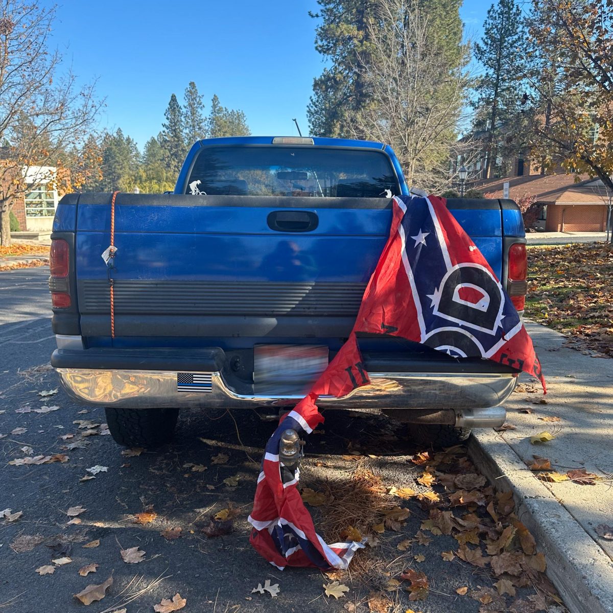 Destroyed Confederate flag attached to a truck, Wednesday, Nov. 6, 2024, in Spokane, Wash. | Grace Uppendahl/The Whitworthian, license plate blurred by Caleb Flegel