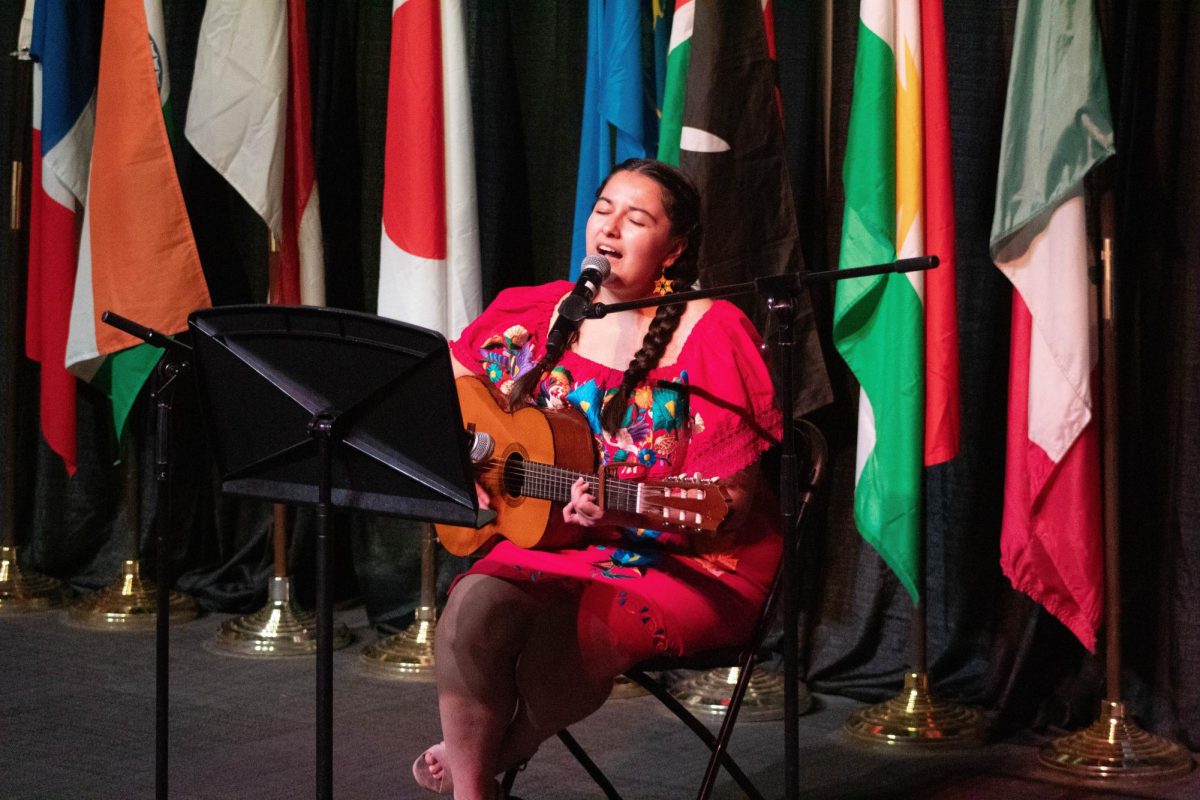 Elena Vigil singing "Cielito Lindo" a traditional Mexican folk song for "IFEST" at Whitworth University in Spokane, Wash. Friday, Nov. 22, 2024. | Abraham Santiago/The Whitworthian