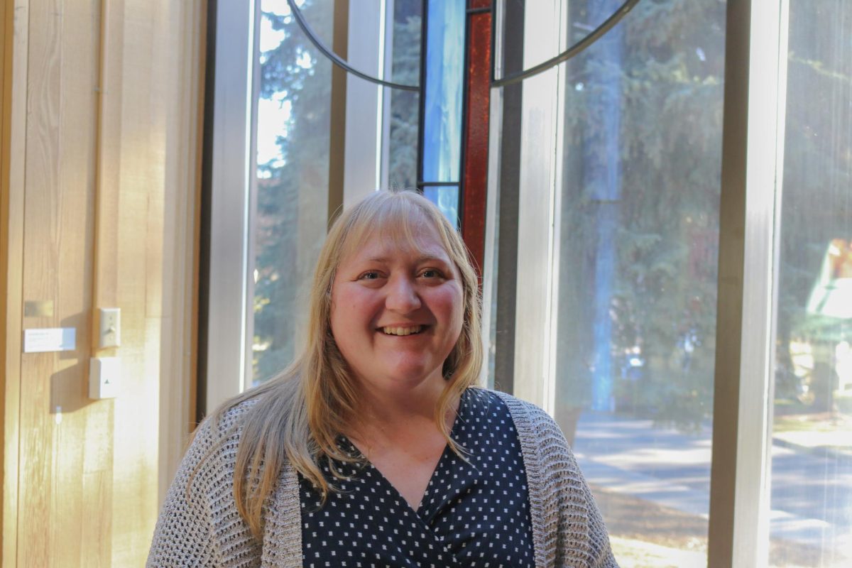 Allison Maus Assistant Director of Summer Fellows Program poses for a photo in the chapel of Beeksma Family Theology Center at Whitworth University, Friday, Feb. 27, 2025, in Spokane, Wash. | Jasmine Olson/The Whitworthian