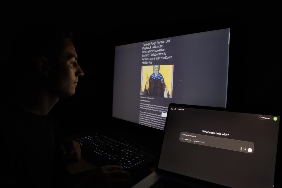 Colton Nussbaum reading AI Articles at Whitworth University, Tuesday, Apr. 22, 2025, in Spokane, Wash |The Whitworthian/Kiernan Martin
