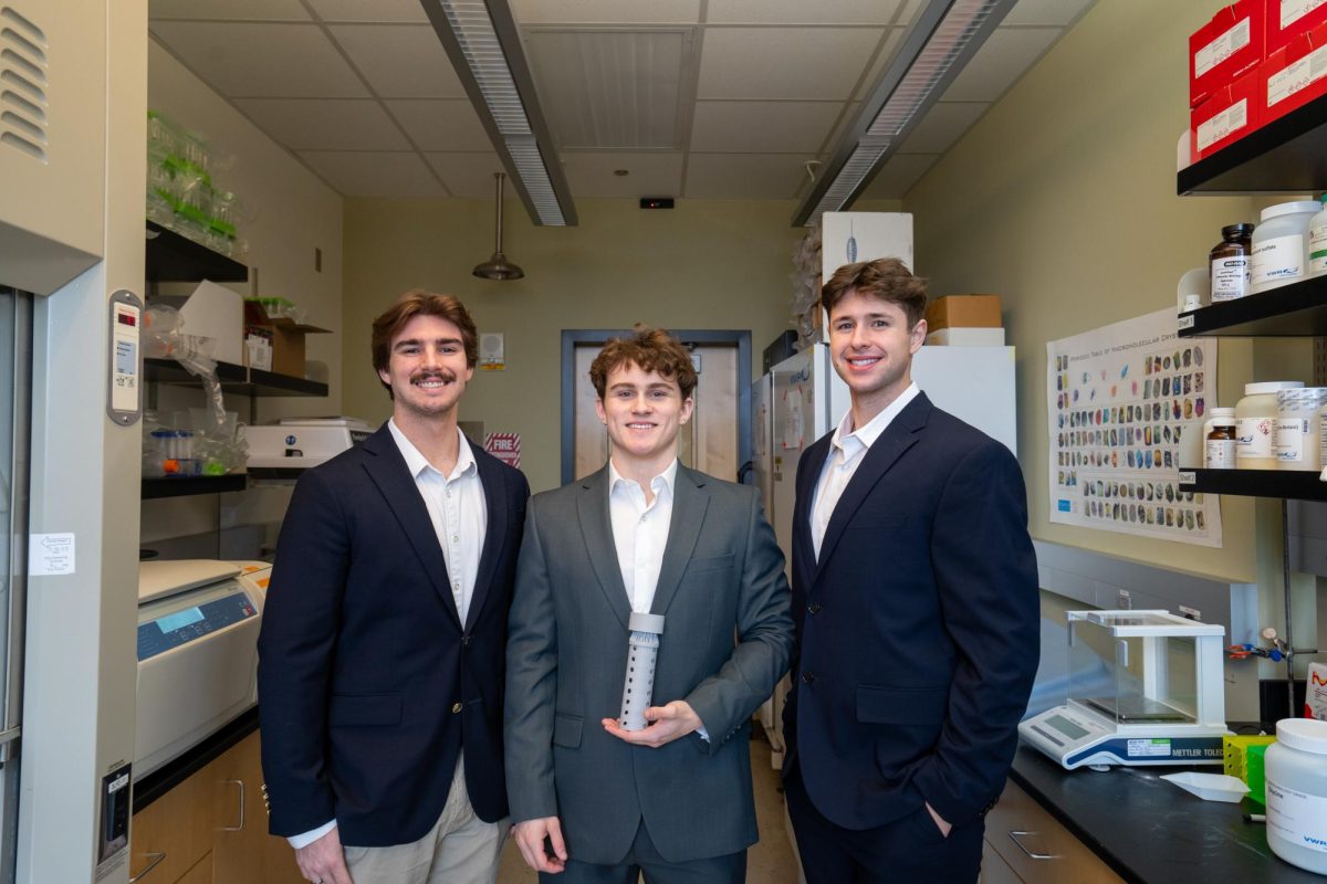 Darren Melville (left), Ty Patterson (middle) and Lance Dunn (right) pose for a photo inside of Robinson Science Center at Whitworth University, Tuesday, Feb. 25, 2025, in Spokane, Wash | Gana Battumur/The Whitworthian