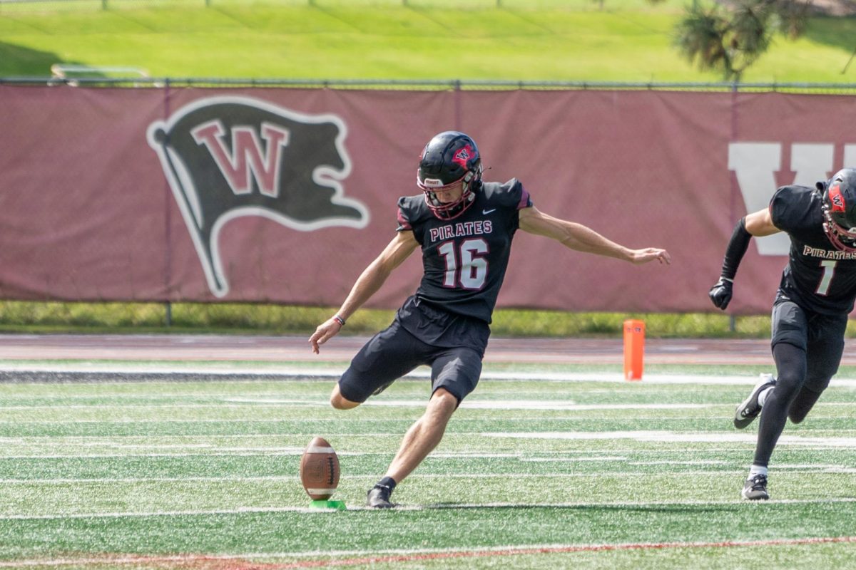 First year kicker #16 Jake Gaffaney takes a kickoff, Saturday, Sep. 14, 2024, at an NCAA football game against Eastern Oregon Univerity at the Whitworth Pine Bowl in Spokane, Wash. | Photo by Caleb Flegel, courtesy of Whitworth Athletics