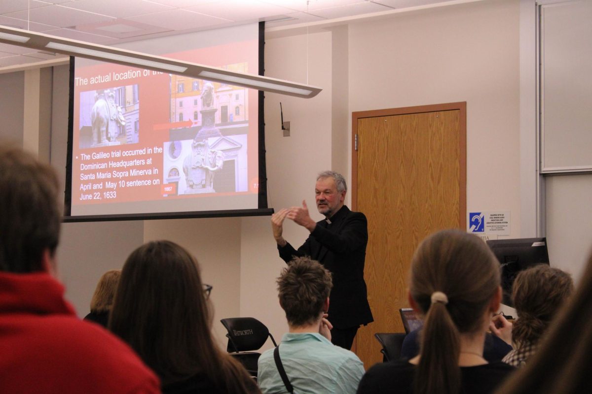 Rev. Michael Maher S.J. giving his input about Galileo Galilei and the Catholic Church in Weyerhaeuser Hall at Whitworth University, Thursday, April 3, 2025, in Spokane, Wash | Mikaela Butlay/ The Whitworthian