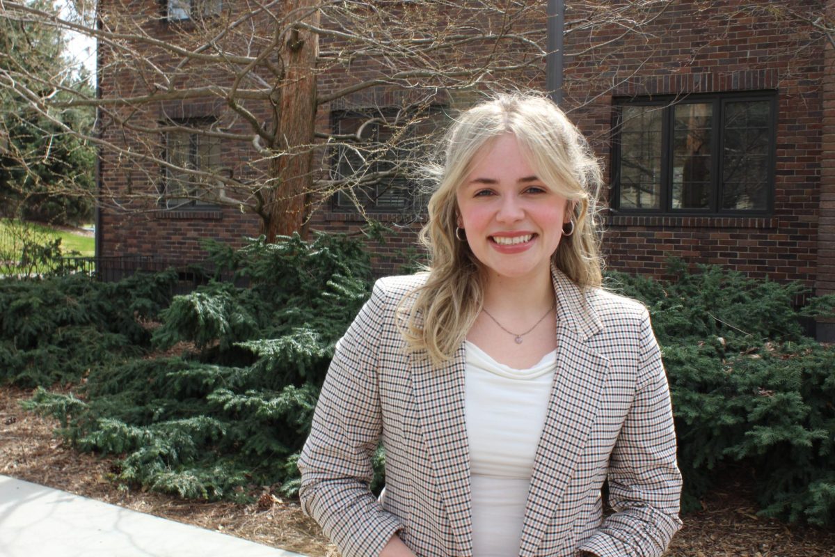 The incoming 2025-26 ASWU President, Abby Ruffcorn, poses for a photograph in front of Ballard Hall, Thursday, Apr. 10, 2025, at Whitworth University in Spokane, Wash. | Alyssa Hammer/The Whitworthian