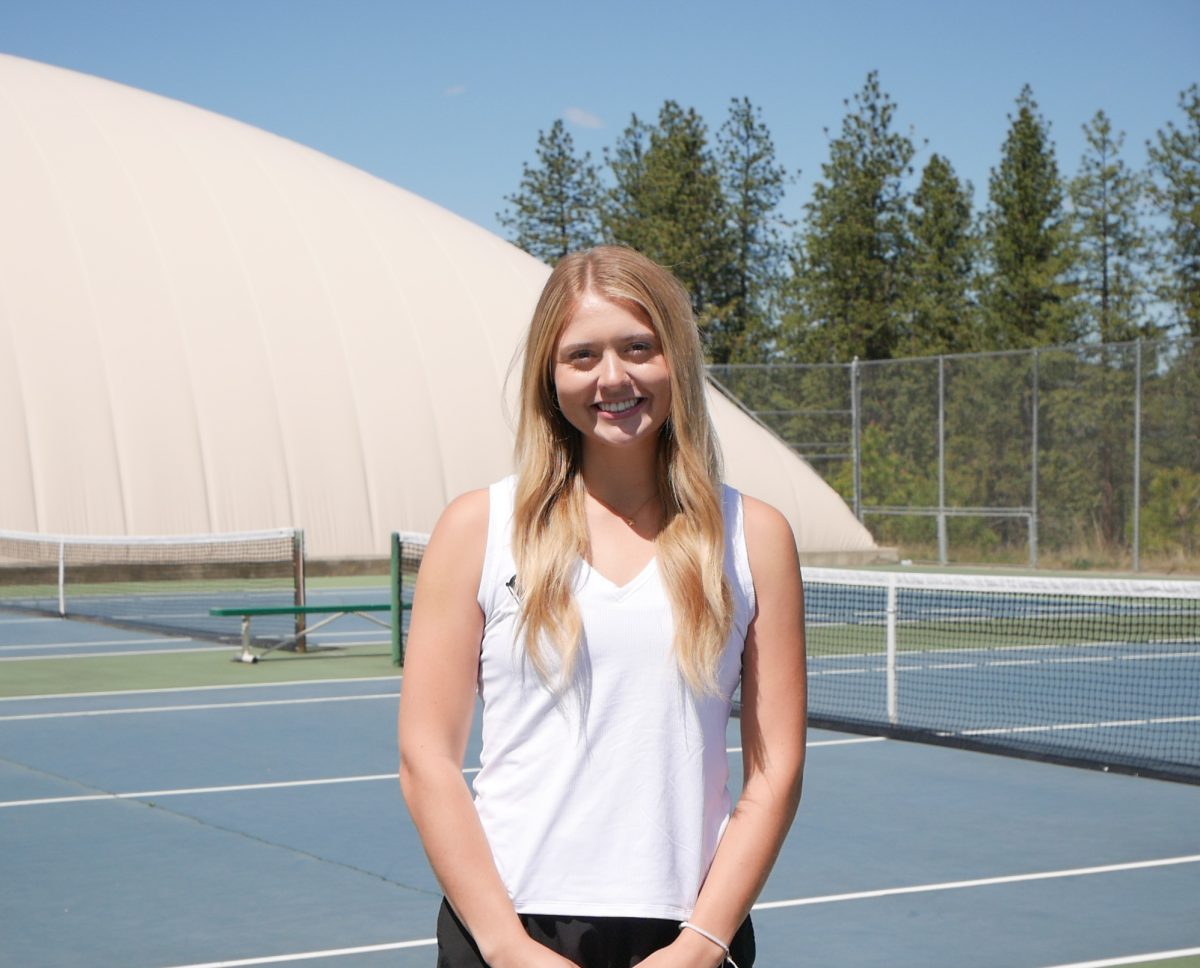 Clara Todd poses for a portrait on the Ross Cutter Tennis Courts outside of the Scotford Tennis Center at Whitworth University, Monday, May 5, 2025, in Spokane, Wash. | Stella Fergin/The Whitworthian