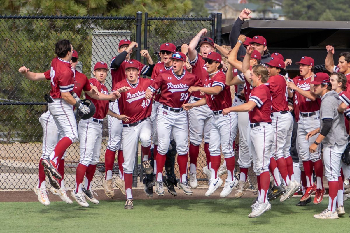The Whitworth baseball team celebrates after a home run by #42 Kyle Memarian, Saturday, April 5, 2025, at an NCAA baseball game against Willamette University at Merkel Field in Spokane, Wash. | Caleb Flegel/The Whitworthian