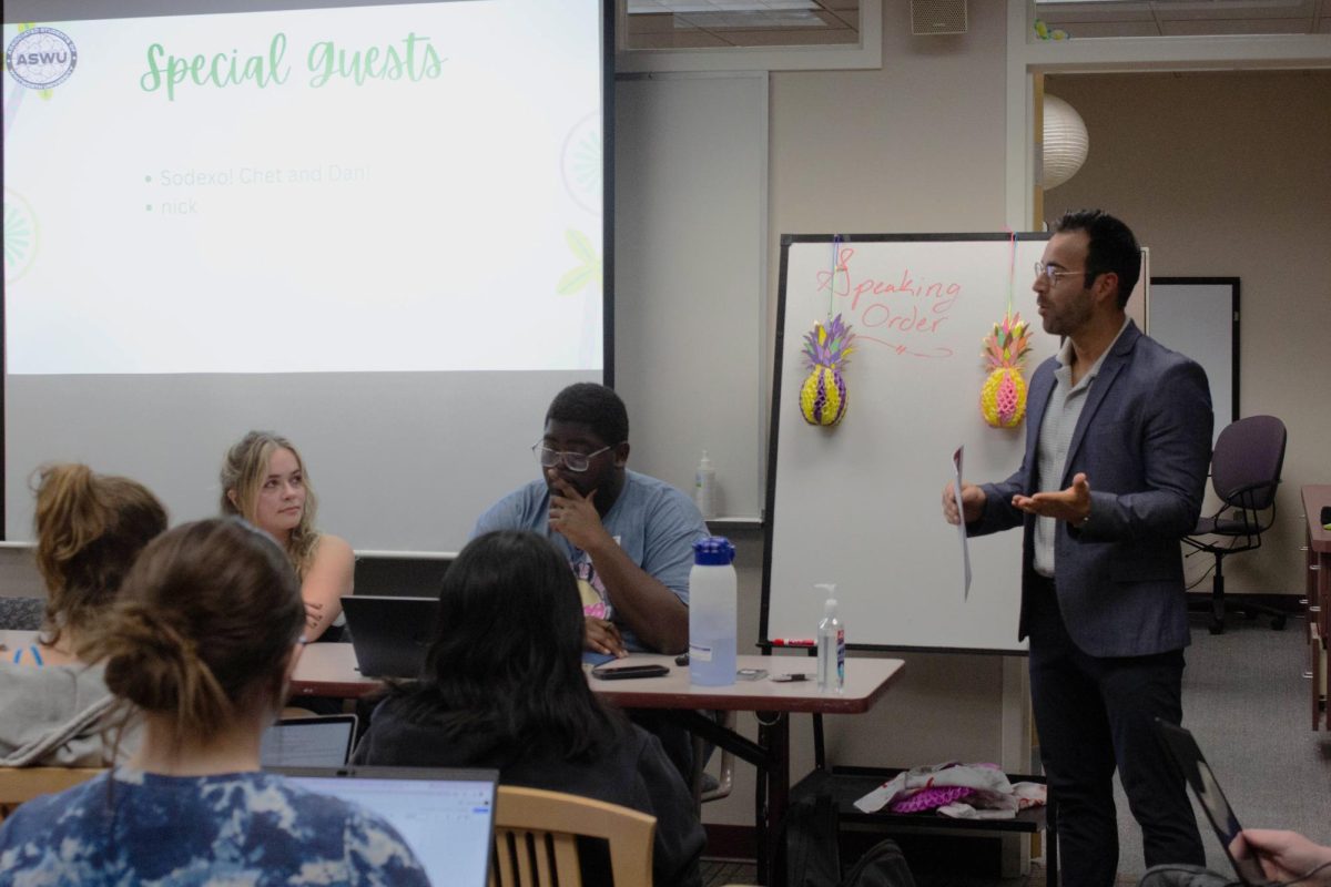 Guest speaker presenting to ASWU members, Wednesday, Sep. 24, in Spokane, Wash. | The Whitworthian/Legend Isumu