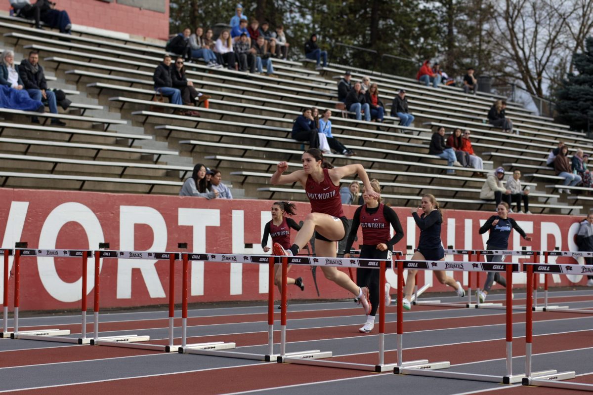 Emily Brown competes in hurdles at Whitworth University track meet, Friday, Feb. 27, 2026, in Spokane, Wash. | The Whitworthian/Riley Brubaker